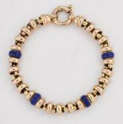 A 9 CARAT BI-COLOUR GOLD AND BLUE ENAMEL BRACELET