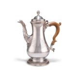 A GEORGE III SILVER COFFEE POT