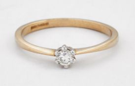 A 9 CARAT GOLD SOLITAIRE DIAMOND RING