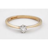 A 9 CARAT GOLD SOLITAIRE DIAMOND RING