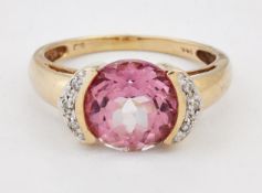 A PINK TOPAZ AND DIAMOND RING