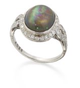 A BLACK OPAL AND DIAMOND CLUSTER RING