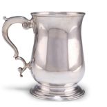 A GEORGE III SILVER PINT MUG