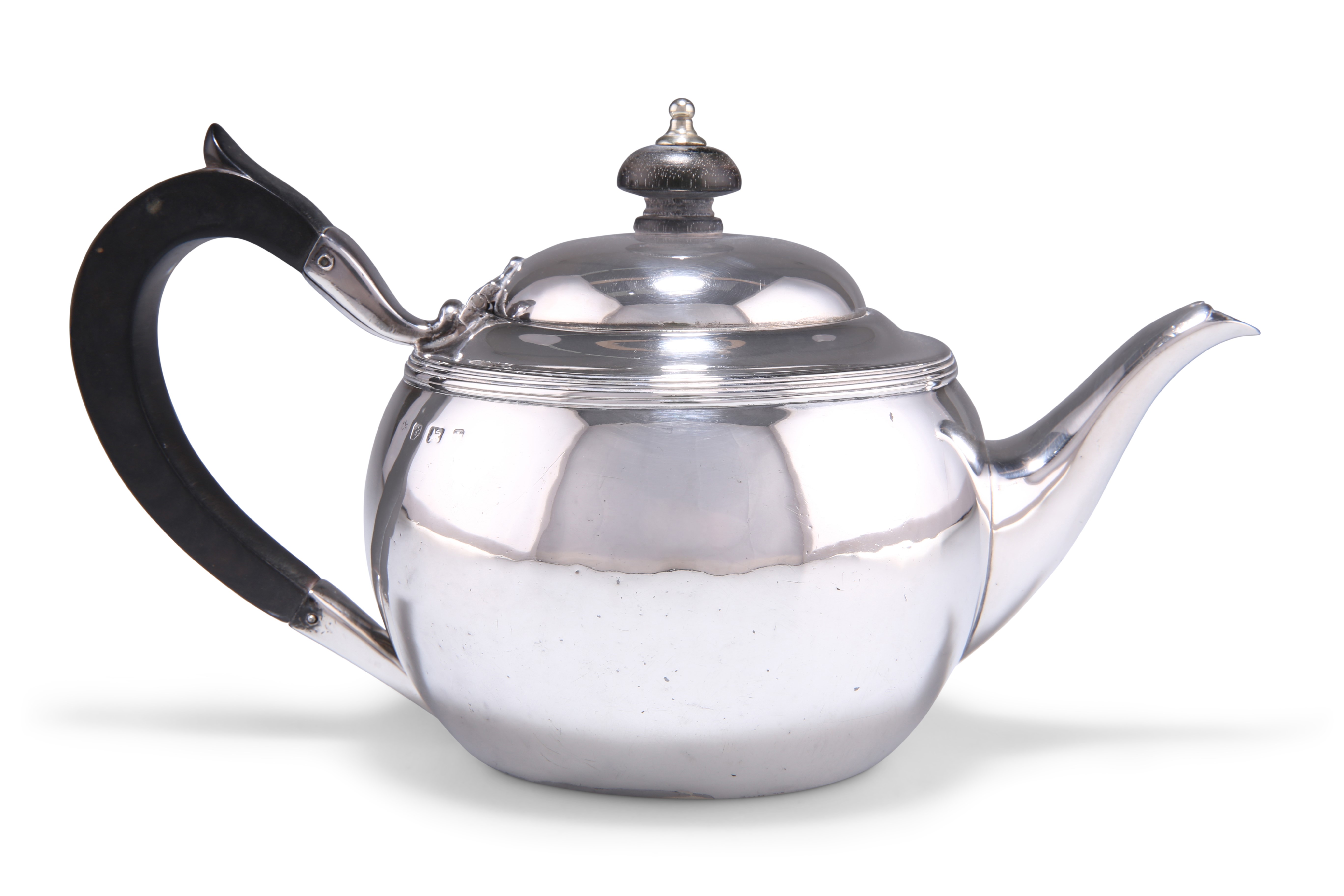 A GEORGE V SILVER TEAPOT