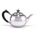 A GEORGE V SILVER TEAPOT