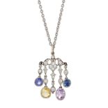 AN EARLY 20TH CENTURY FANCY COLOURED SAPPHIRE AND DIAMOND PENDANT ON CHAIN