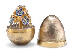 AN ELIZABETH II SILVER-GILT LIMITED EDITION SURPRISE EGG