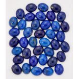 A GROUP OF LAPIS LAZULI OVAL CABOCHONS