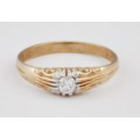 A 9 CARAT GOLD SOLITAIRE DIAMOND RING