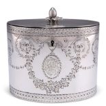 A GEORGE III SILVER TEA CADDY