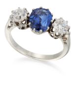 A SAPPHIRE AND DIAMOND THREE STONE RING