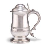 A GEORGE III SILVER LIDDED TANKARD