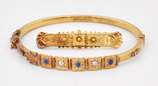 A LATE VICTORIAN 15CT GOLD SAPPHIRE AND DIAMOND BANGLE, AND A LATE VICTORIAN 15CT GOLD BROOCH