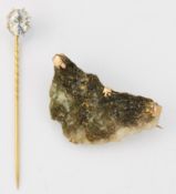 A ROCK CRYSTAL STICK PIN AND A VICTORIAN GOLD IN QUARTZ ROCK BROOCH (2)