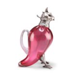 A LARGE SILVER-MOUNTED CRANBERRY GLASS NOVELTY CLARET JUG