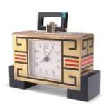 A GILT-BRASS AND ENAMEL ALARM CLOCK, IN THE ART DECO TASTE