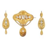 A MID 19TH CENTURY BROOCH AND EARRINGS SUITE