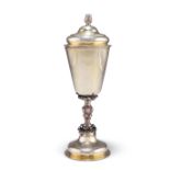 AN 18TH CENTURY RUSSIAN PARCEL-GILT SILVER CUP AND COVER