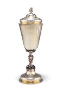 AN 18TH CENTURY RUSSIAN PARCEL-GILT SILVER CUP AND COVER