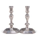 A PAIR OF ELIZABETH II CAST SILVER CANDLESTICKS