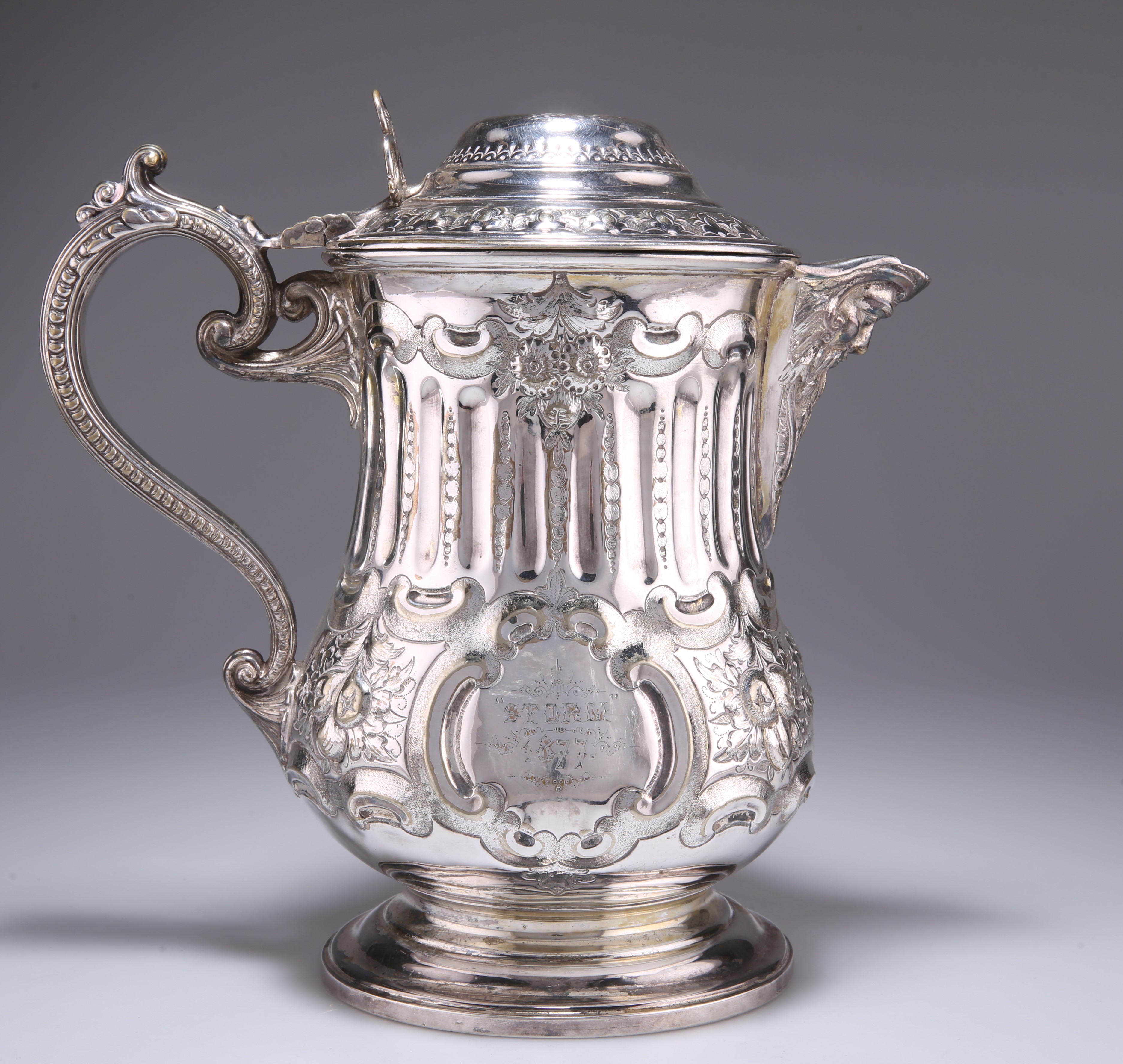 A LARGE 19TH CENTURY SILVER-PLATED FLAGON