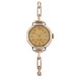 A LADY'S 9 CARAT GOLD ROLEX BRACELET WATCH