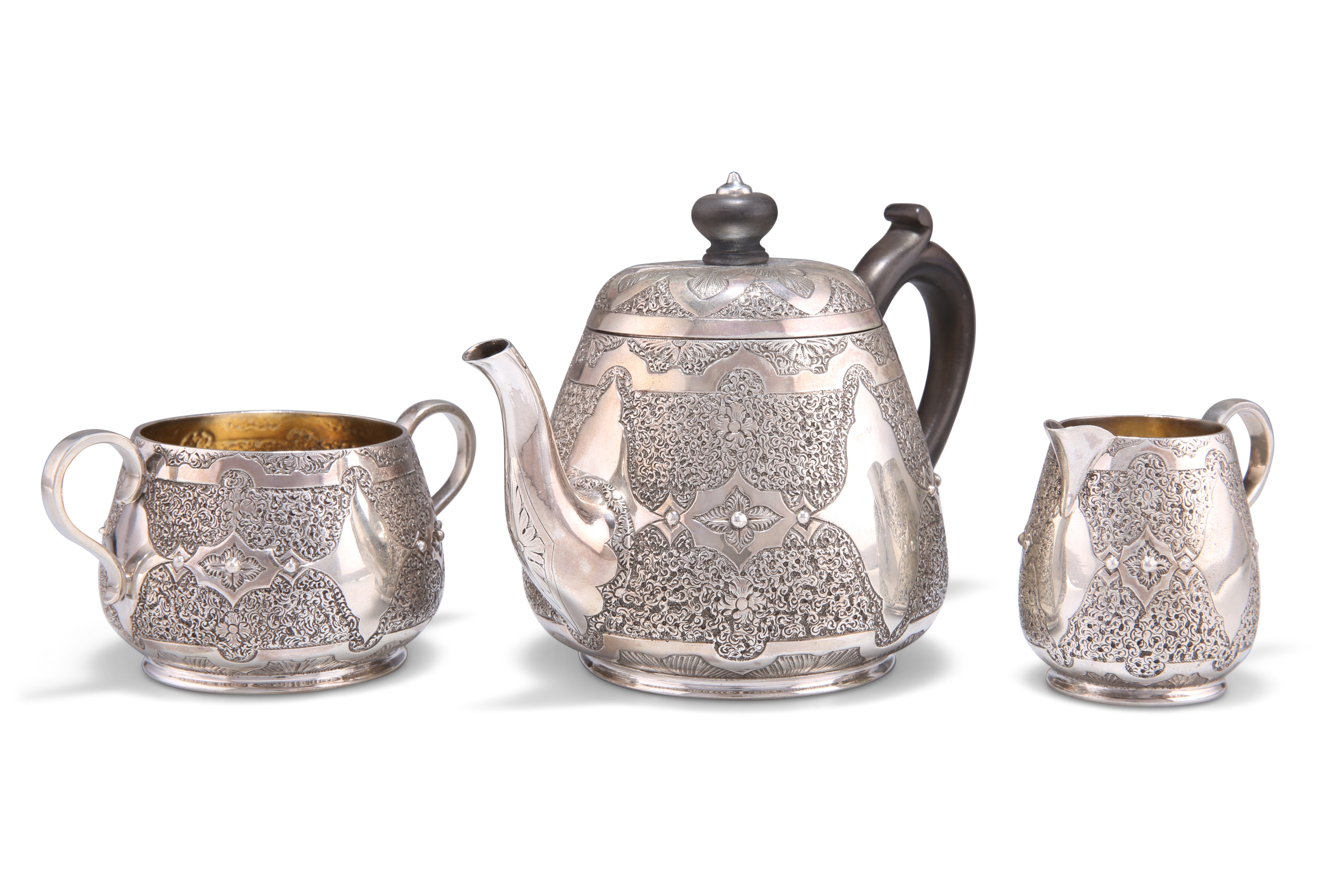 A VICTORIAN SILVER THREE-PIECE BACHELOR'S TEA SERVICE