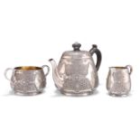 A VICTORIAN SILVER THREE-PIECE BACHELOR'S TEA SERVICE