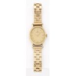 A LADY'S 9 CARAT GOLD OMEGA BRACELET WATCH