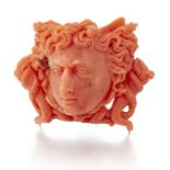 A CORAL CAMEO BROOCH