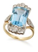 AN 18 CARAT GOLD BLUE TOPAZ AND DIAMOND RING