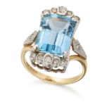 AN 18 CARAT GOLD BLUE TOPAZ AND DIAMOND RING