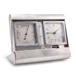 AN EDWARD VIII SILVER-CASED CLOCK AND BAROMETER