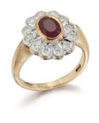 A 9CT GOLD RUBY AND DIAMOND CLUSTER RING