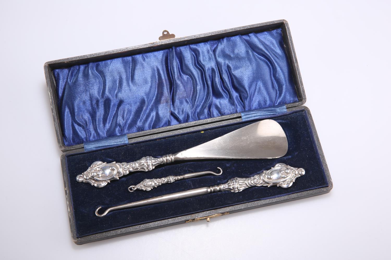 A GEORGE V SILVER-HANDLED BUTTON, GLOVE AND SHOE SET - Image 2 of 2