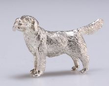 A CAST SILVER MODEL OF A RETRIEVER