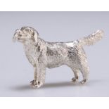 A CAST SILVER MODEL OF A RETRIEVER