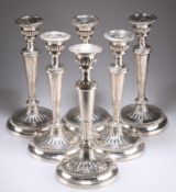 A RARE SET OF SIX GEORGE III LARGE SILVER TABLE CANDLESTICKS