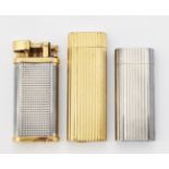 A GROUP OF THREE VINTAGE LIGHTERS
