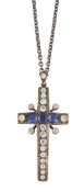 A CUBIC ZIRCONIA AND SYNTHETIC SAPPHIRE CROSS PENDANT ON CHAIN