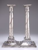 A PAIR OF OLD SHEFFIELD PLATE CANDLESTICKS