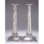 A PAIR OF OLD SHEFFIELD PLATE CANDLESTICKS