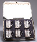 A SET OF SIX GEORGE V SILVER TOT CUPS