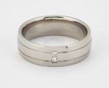 A PALLADIUM DIAMOND BAND RING