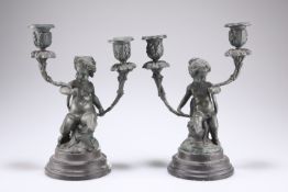 A PAIR OF BRONZE TWO-LIGHT CANDELABRA