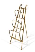 AN EDWARDIAN BRASS THREE DIVISION COLLAPSIBLE NEWSPAPER RACK