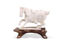 A CHINESE IVORY CARVING OF A HORSE, 19TH CENTURY