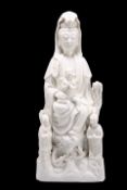 A LARGE CHINESE BLANC DE CHINE MODEL OF A GUANYIN
