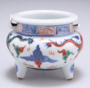A SMALL CHINESE DOUCAI PORCELAIN TRIPOD CENSER