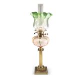 AN EDWARDIAN BRASS COLUMNAR OIL LAMP